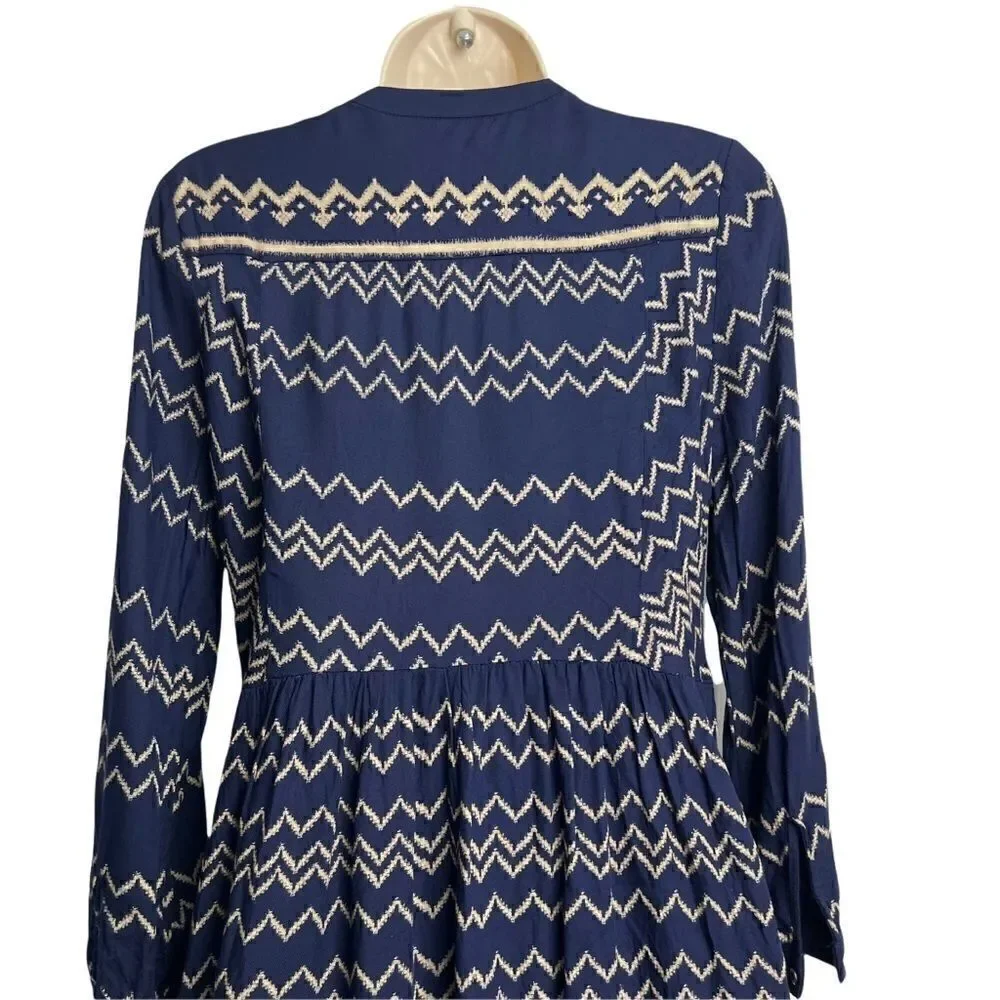 Holding Horses Anthropologie Navy and tan graphic print long sleeve dress